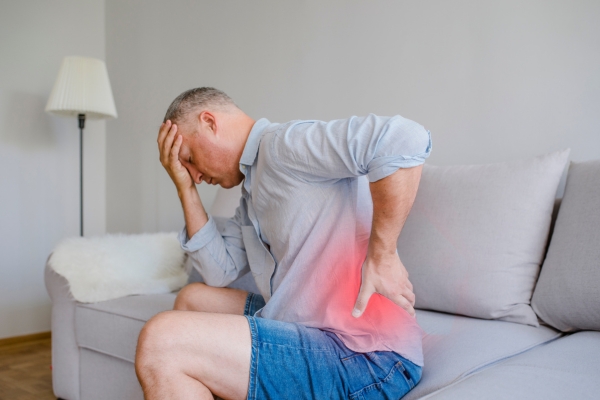 man in unbearable back pain