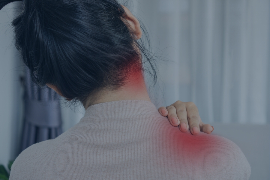woman with neck pain and a headache