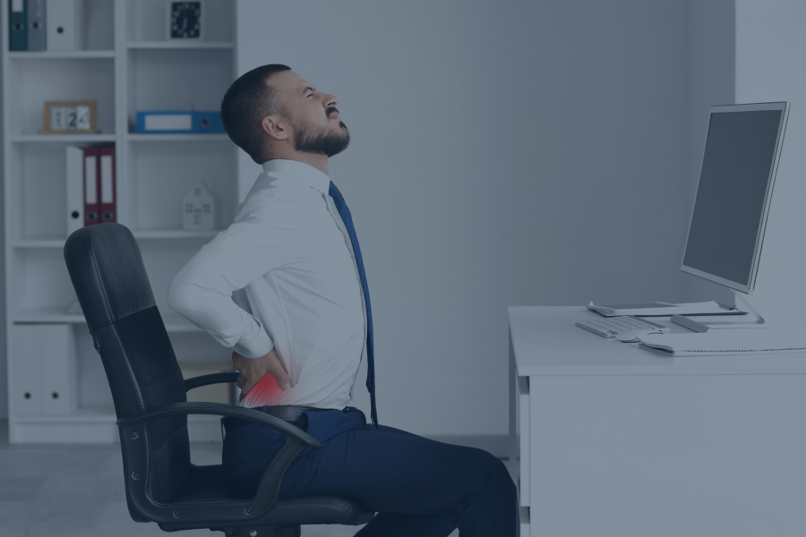 man sitting in pain